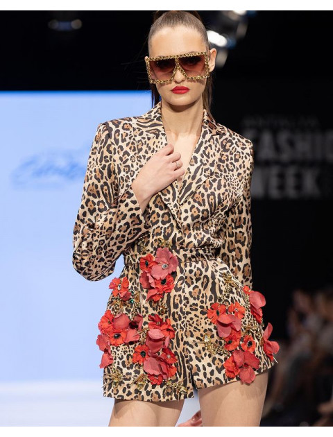 Leopard with red flowers